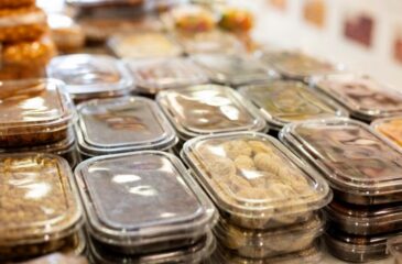 Food grade packaging storing prepared meals in sealed containers for safe distribution
