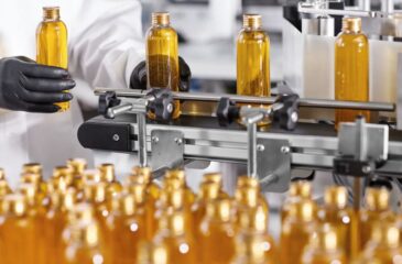 Automated contract packaging line filling bottles in a production facility